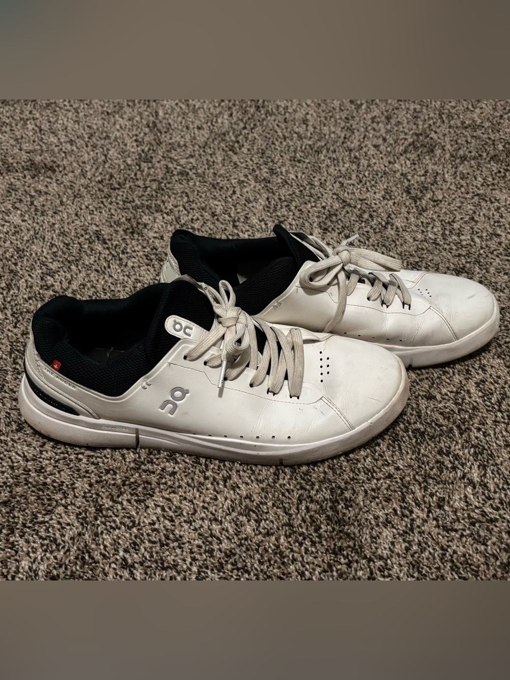 On Running Men’s White Leather Sneakers with Black Lining
